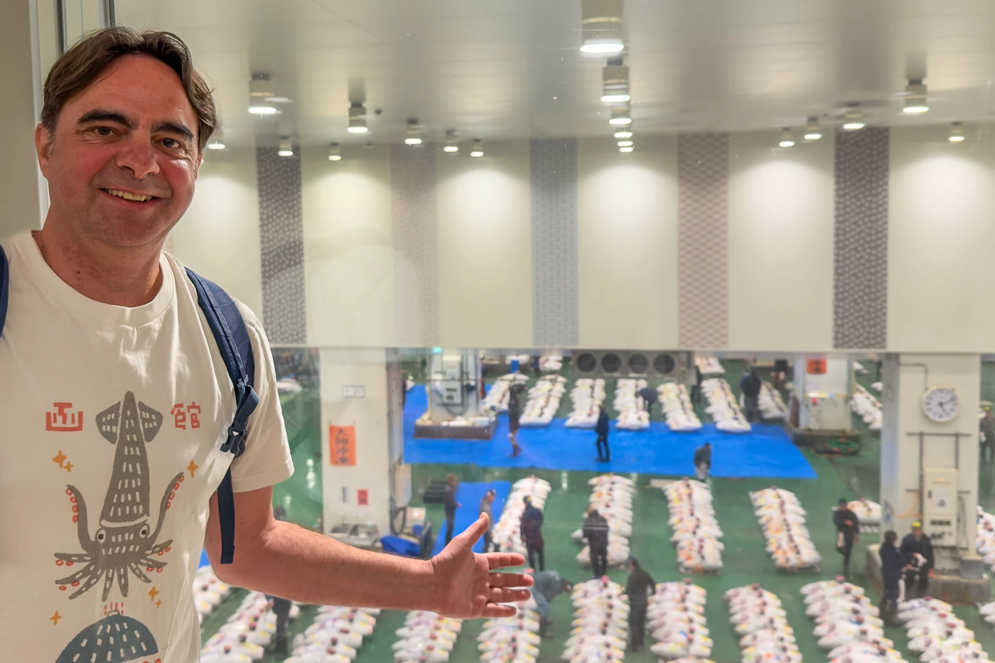 Chris P King from Food Tours Japan at Toyosu tuna auction public viewing windows