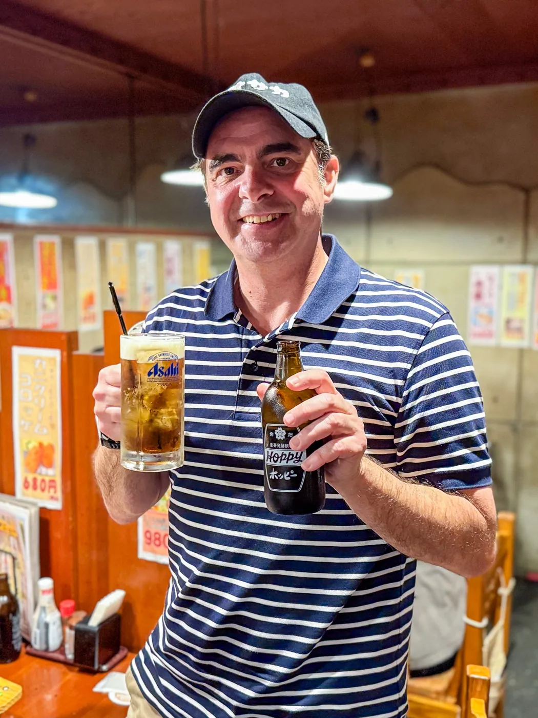 Chris P King from Food Tours Japan drinking a shochu cocktail