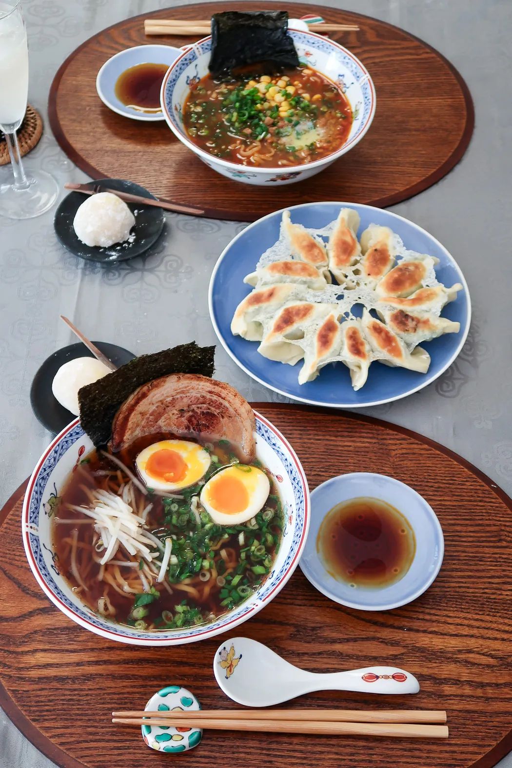 Two types of ramen and gyoza made by Chris P King at a ramen-making class in Osaka
