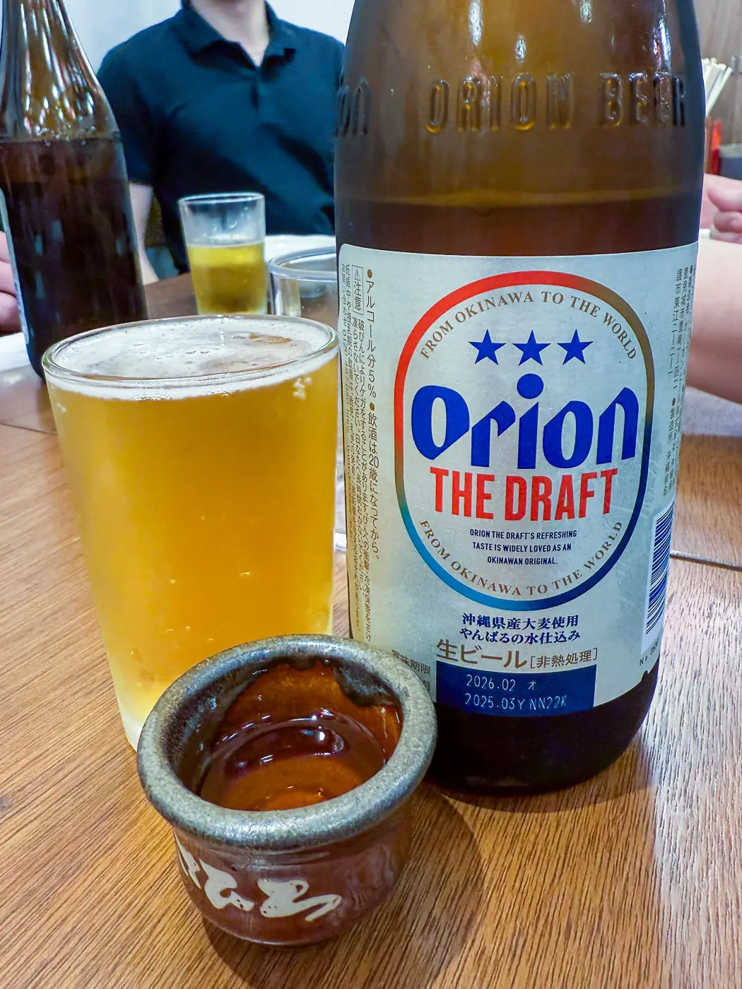 Orion beer and awamori from Okinawa on the Shinjuku food tour