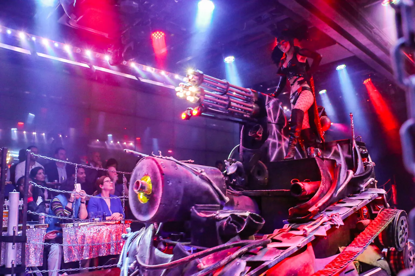 Girl riding at tank at the Robot Restaurant show