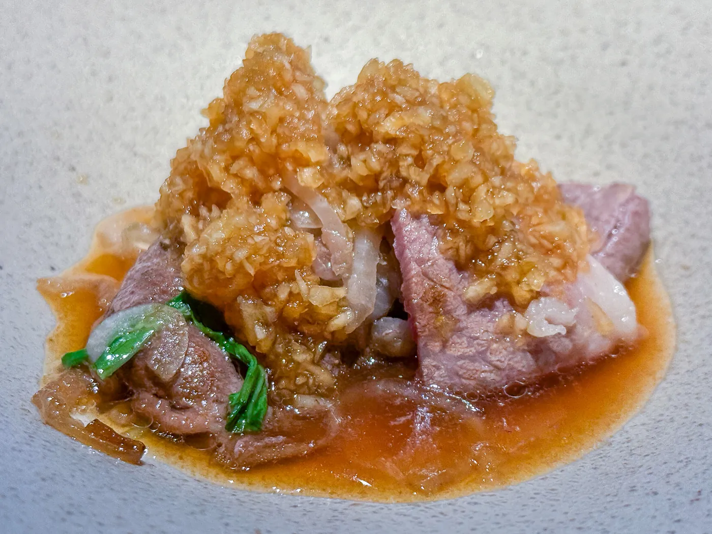 Thinly sliced A5 wagyu with onion and salt ponzu sauce
